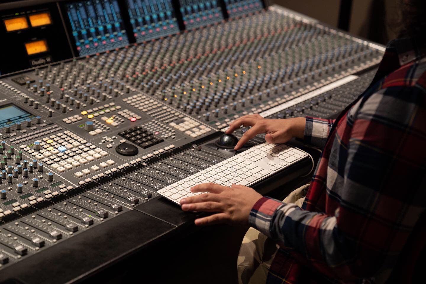 Engineer mixing on the console at Divine Aspect Studio, Greenville SC